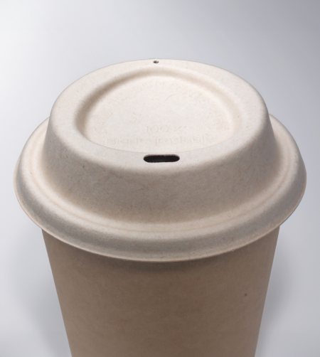 Plant-based compostable coffee lid made from upcycled hemp fiber, perfect for disposable hot beverage cups.